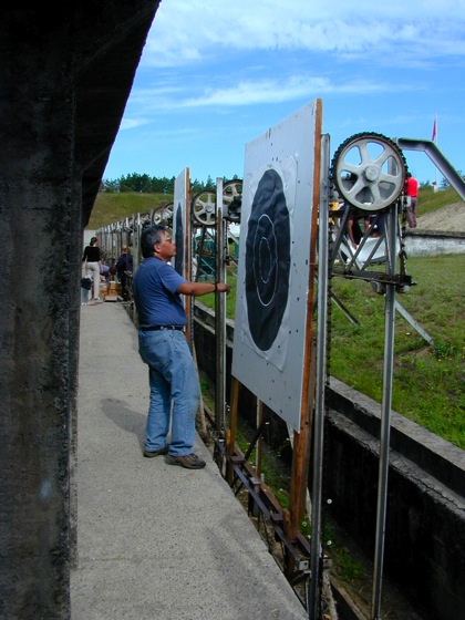 mike chung checking target for holes